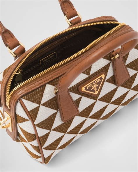 prada symbole embroidered fabric top-handle bag|Prada Symbole embroidered fabric top.